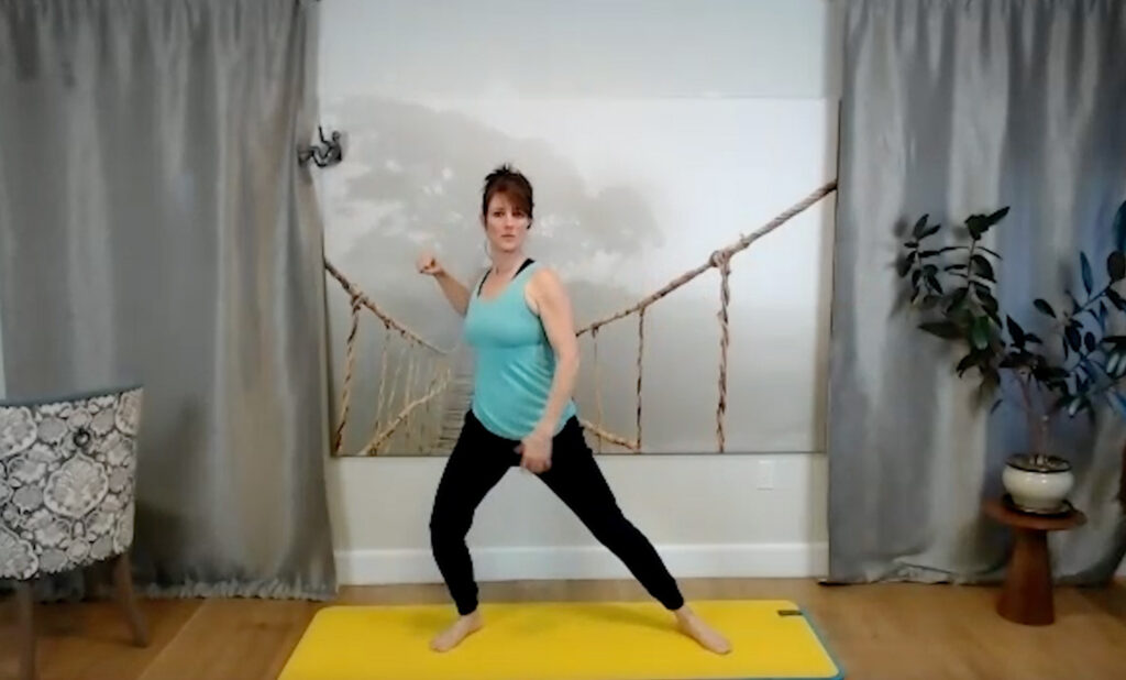 Justina Bailey Stretching during Aging Backwards Class